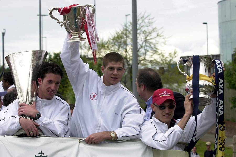 triple-decker-on-the-bus-parade-to-mark-liverpools-fa-cup-league-cup-and-uefa-cup-treble-in-2001-136395242158426903-150102165057